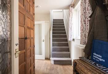 The hallway is just the place for walking boots or sandy shoes.