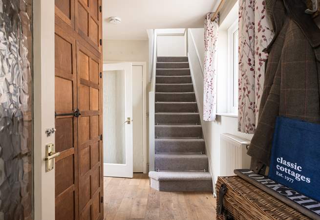The hallway is just the place for walking boots or sandy shoes.