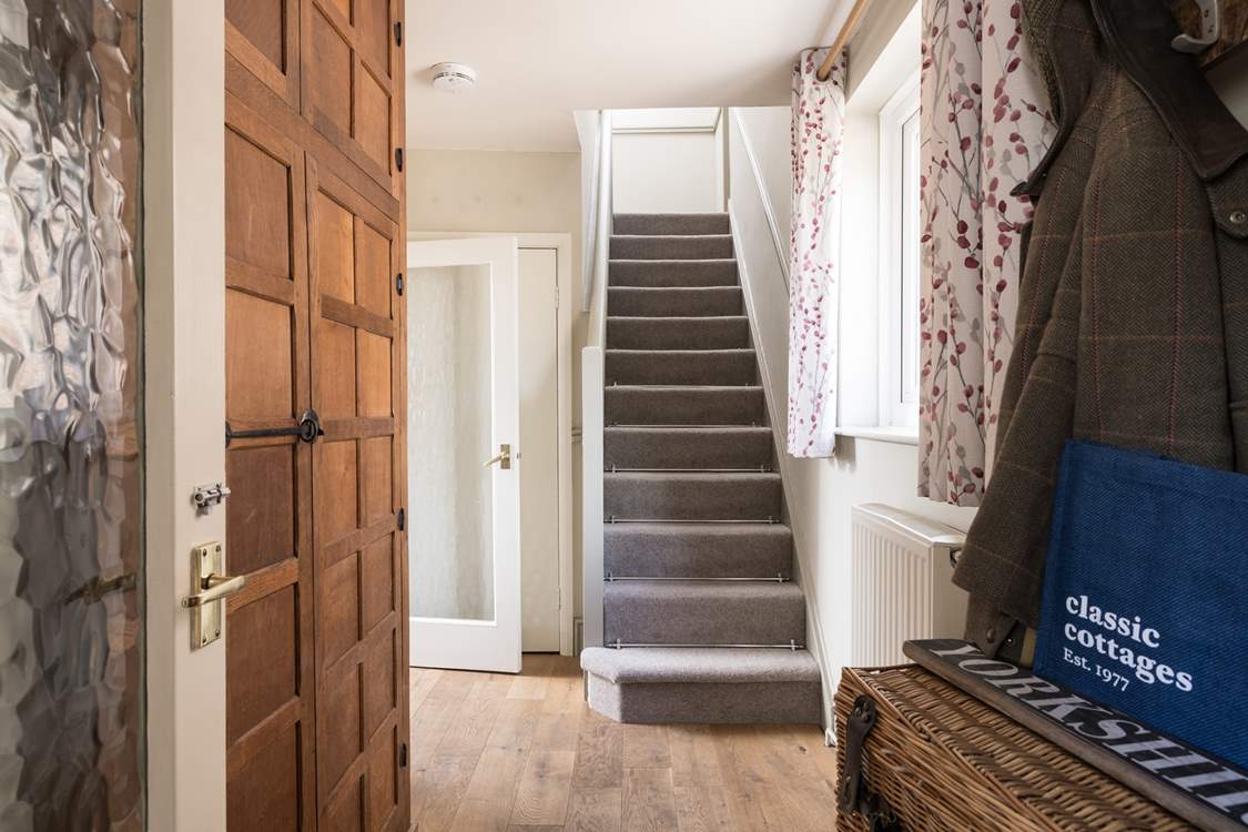 The hallway is just the place for walking boots or sandy shoes.