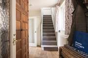 The hallway is just the place for walking boots or sandy shoes.