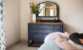 Vintage furniture makes a stylish statement in the bedroom. - Thumbnail Image