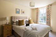 Such a lovely light and sunny bedroom.