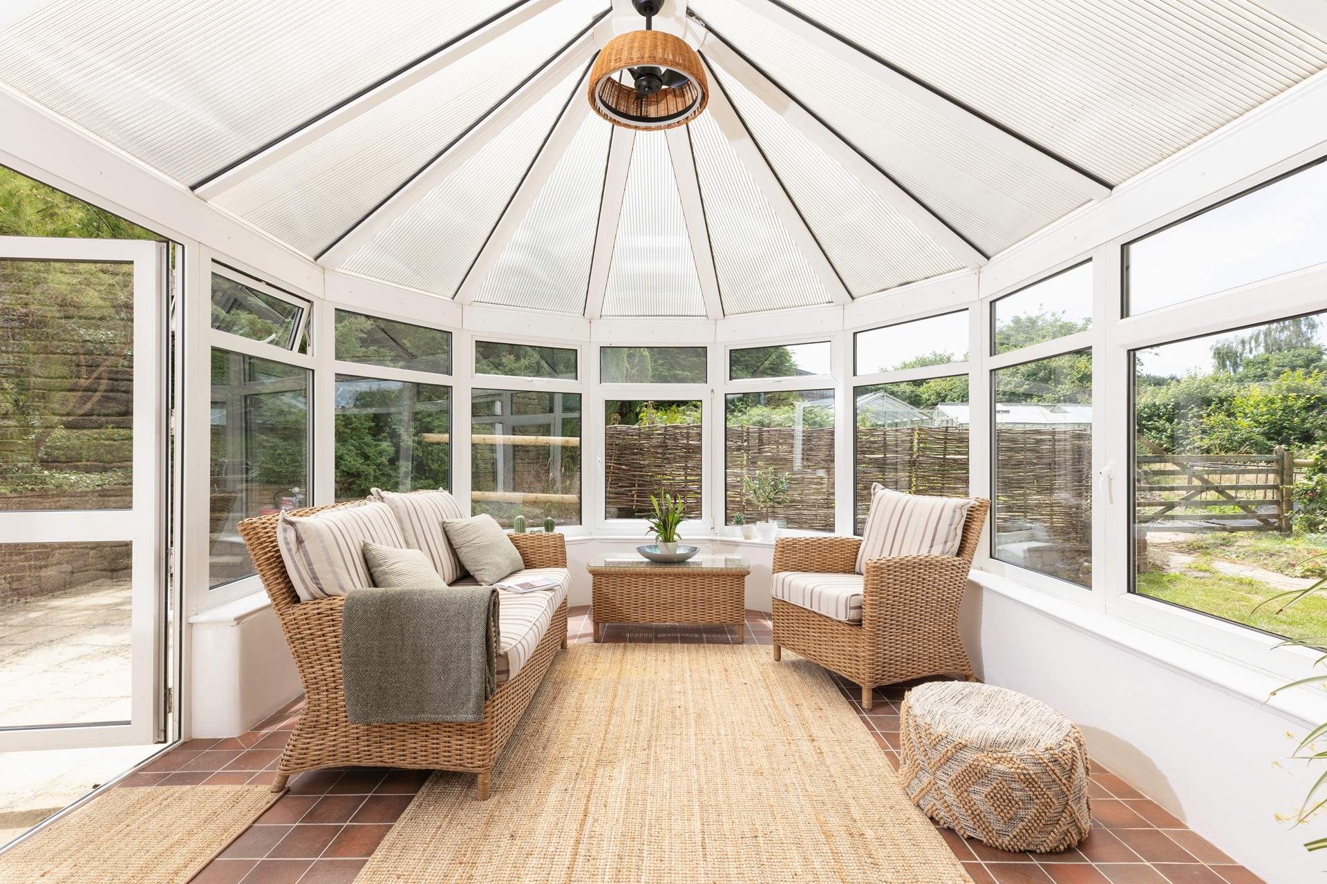 Just off the kitchen/dining-room there is a sunny conservatory with doors to the patio.