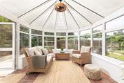 Just off the kitchen/dining-room there is a sunny conservatory with doors to the patio.