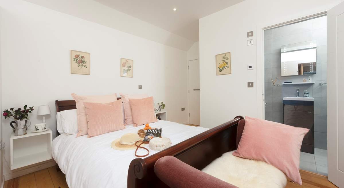 The en suite double bedroom is perfect for a restful night's sleep.