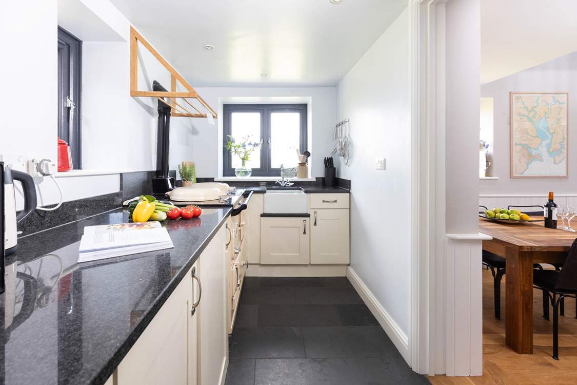 The kitchen looking through to the sitting/dining-room.