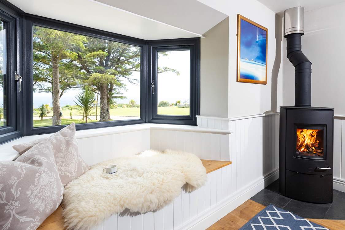 Snuggle up in front of the cosy wood-burner after a day out walking.
