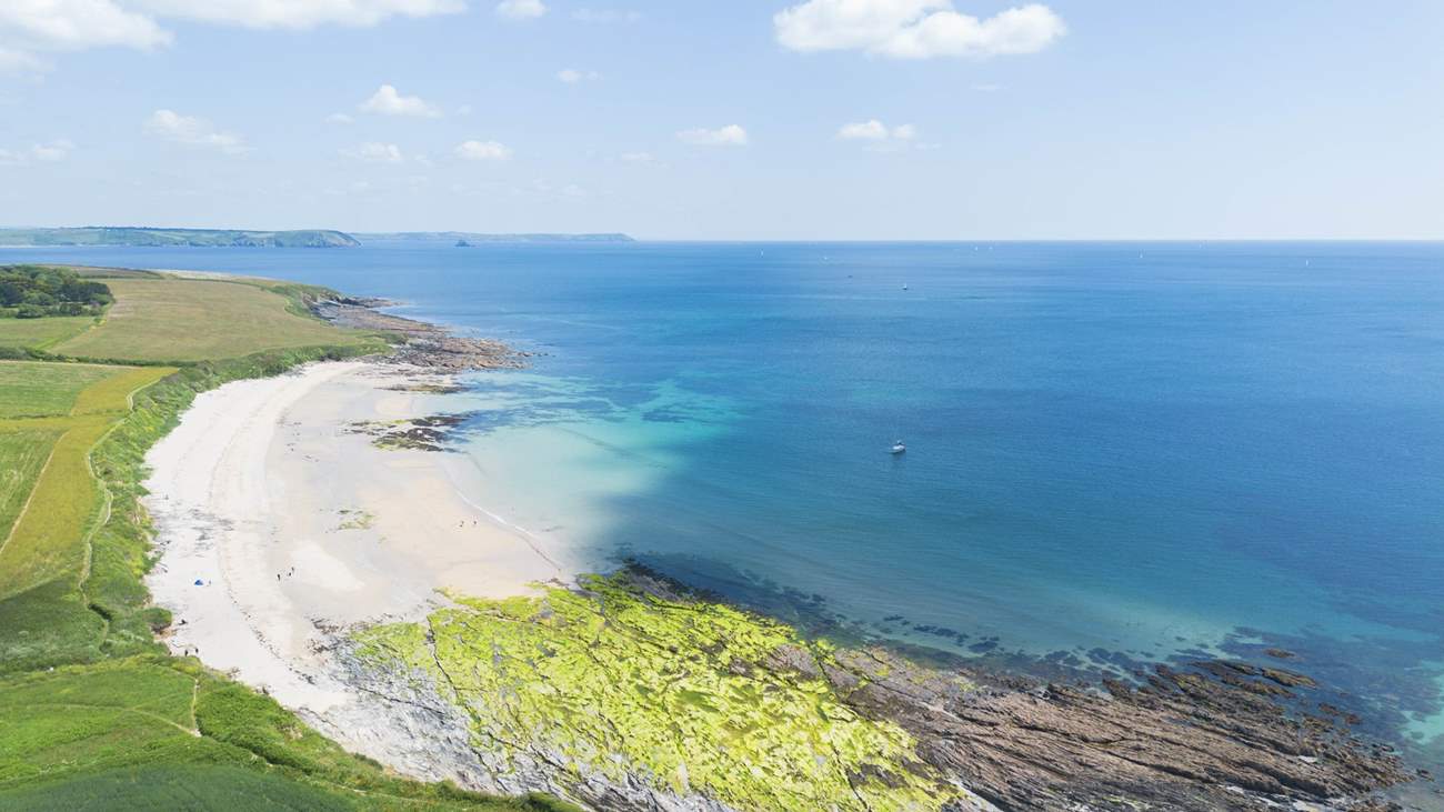 Towan beach with Nare Head and Gull Rock in the distance.