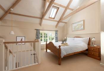 A king-size bed awaits.