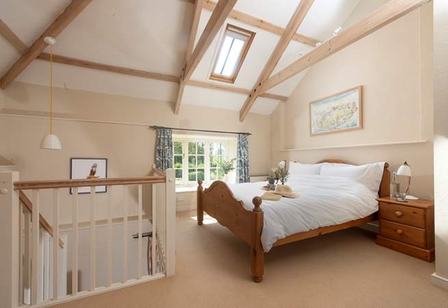 A king-size bed awaits.