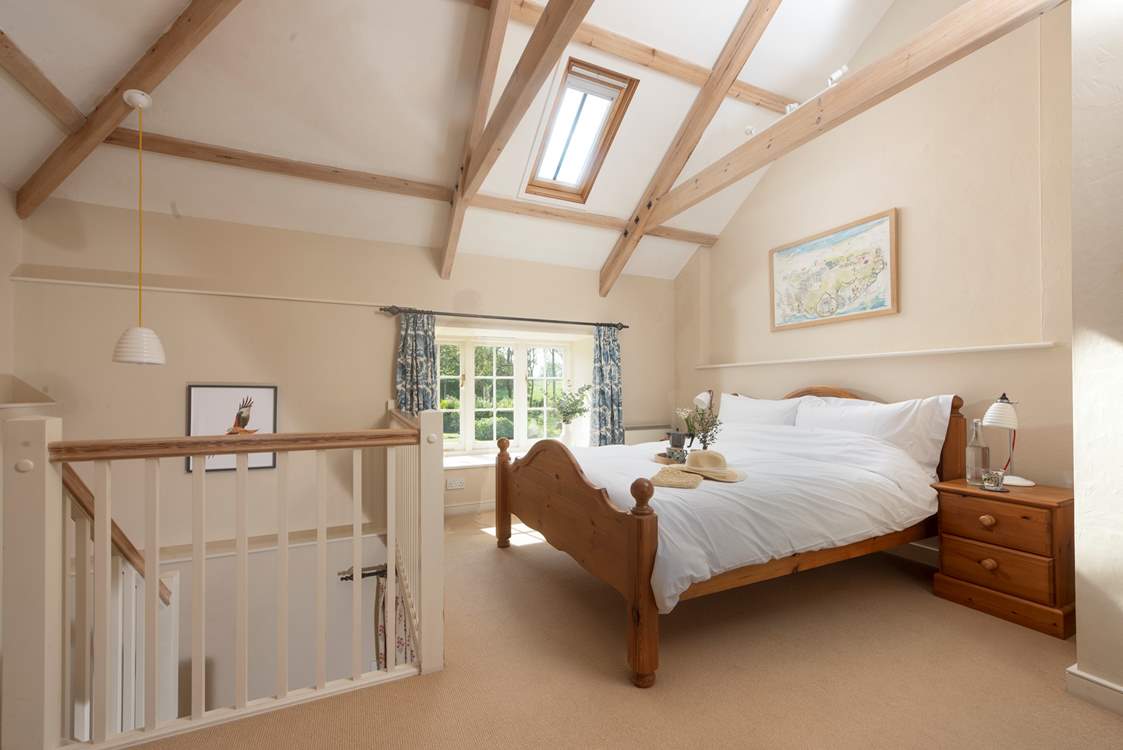 A king-size bed awaits.