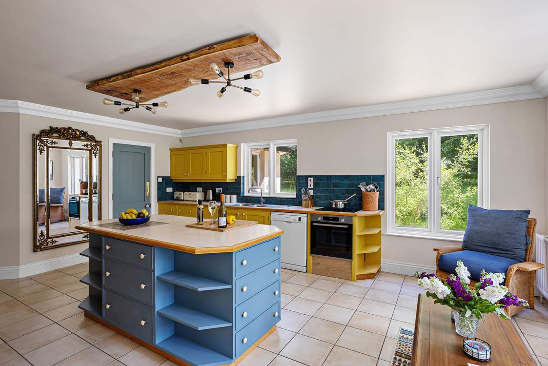 The kitchen has a rather fabulous lighting feature and also boasts a lovely utility-room and a larder meaning you will have plenty of room for your supplies.