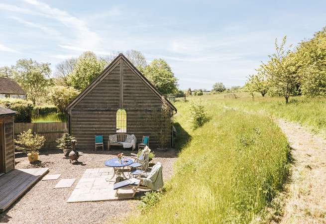 As you look down towards the private garden you can appreciate the idyllic surrounding countryside.