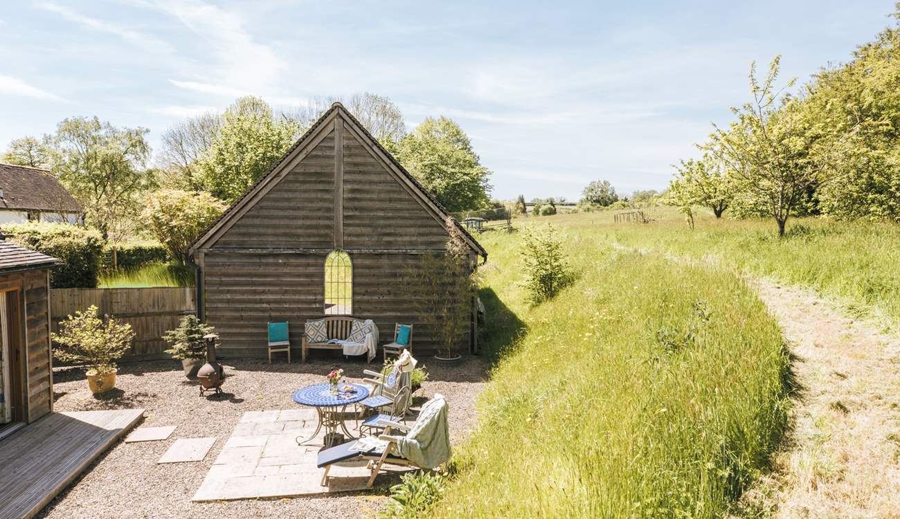 As you look down towards the private garden you can appreciate the idyllic surrounding countryside.