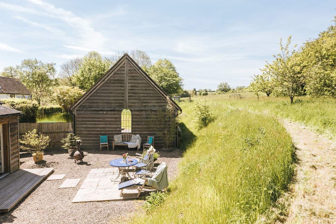 As you look down towards the private garden you can appreciate the idyllic surrounding countryside.