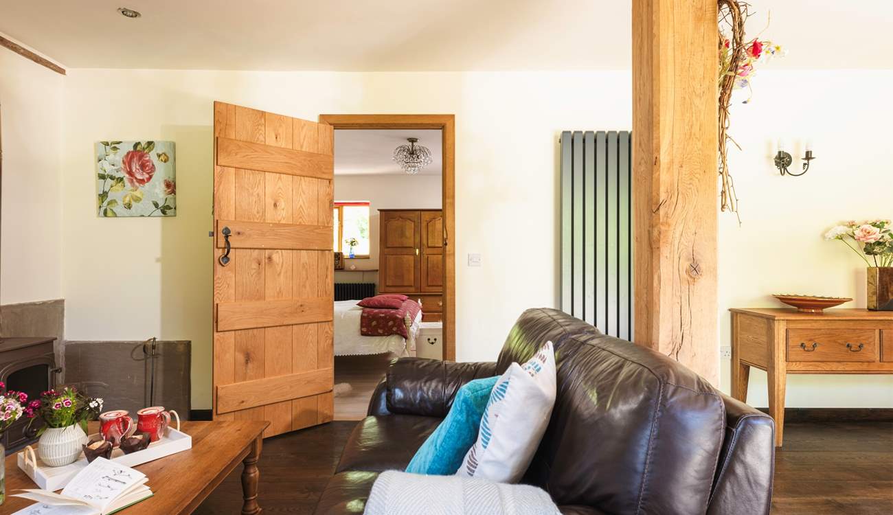 The living area has comfy sofas and a Smart TV to enjoy a movie, or two!