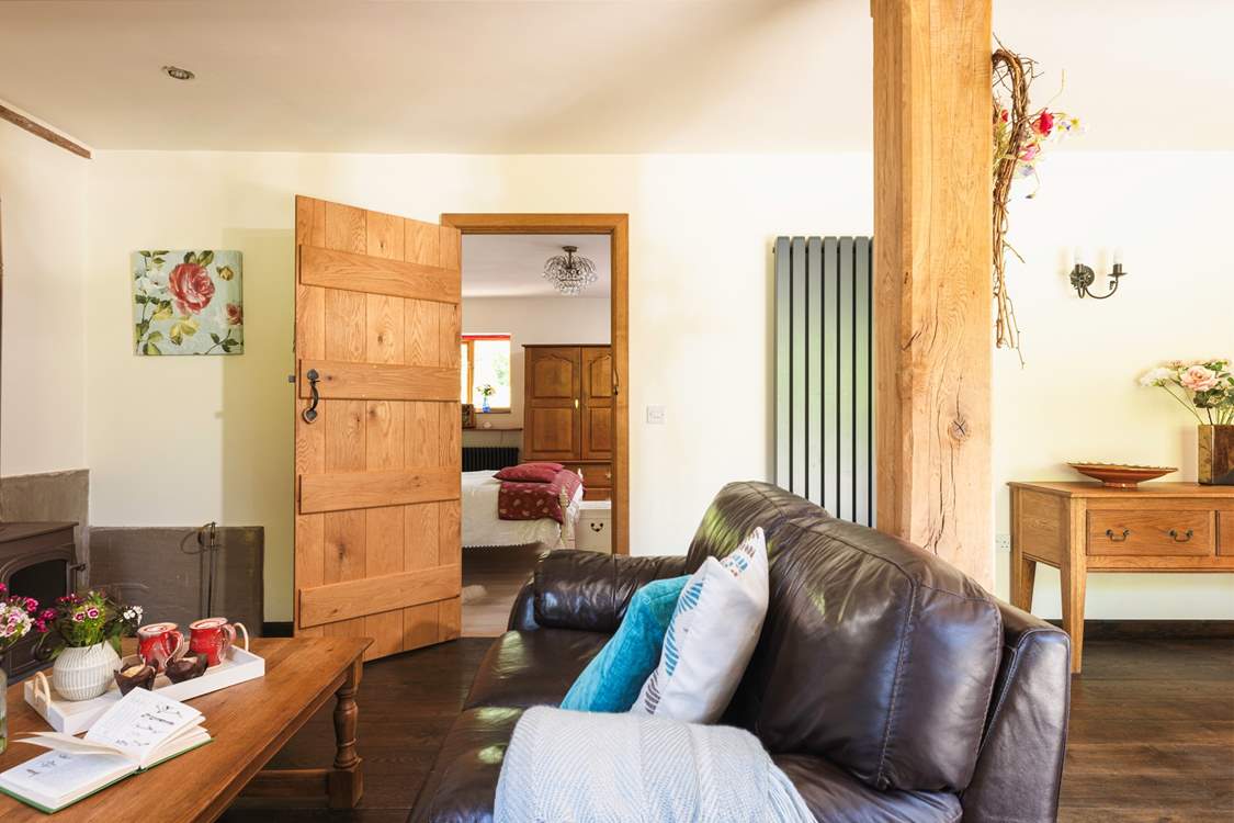 The living area has comfy sofas and a Smart TV to enjoy a movie, or two!
