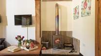 The wood-burner is just perfect for relaxing evenings by the fire. 