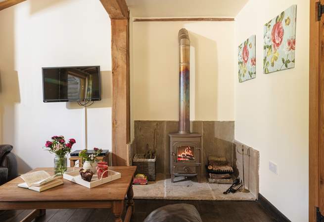 The wood-burner is just perfect for relaxing evenings by the fire. 