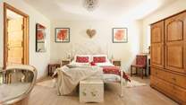 The principal bedroom is light, bright and spacious.