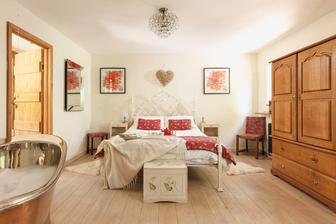 The principal bedroom is light, bright and spacious.