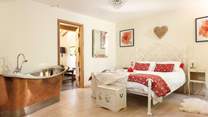 The elegant and stylish principal bedroom will invite you in.