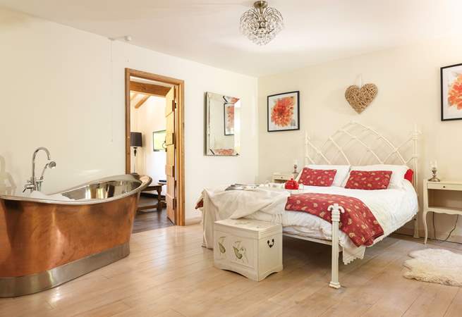 The elegant and stylish principal bedroom will invite you in.