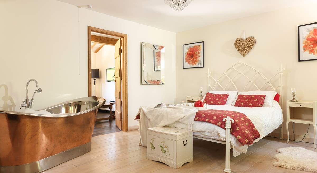 The elegant and stylish principal bedroom will invite you in.