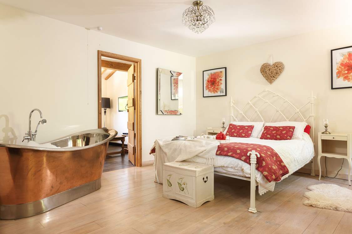 The elegant and stylish principal bedroom will invite you in.