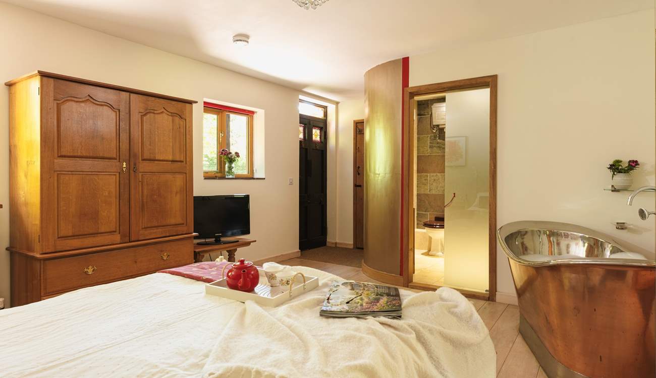 Relax in bed, or soak in the luxurious copper bath...the choice is yours.