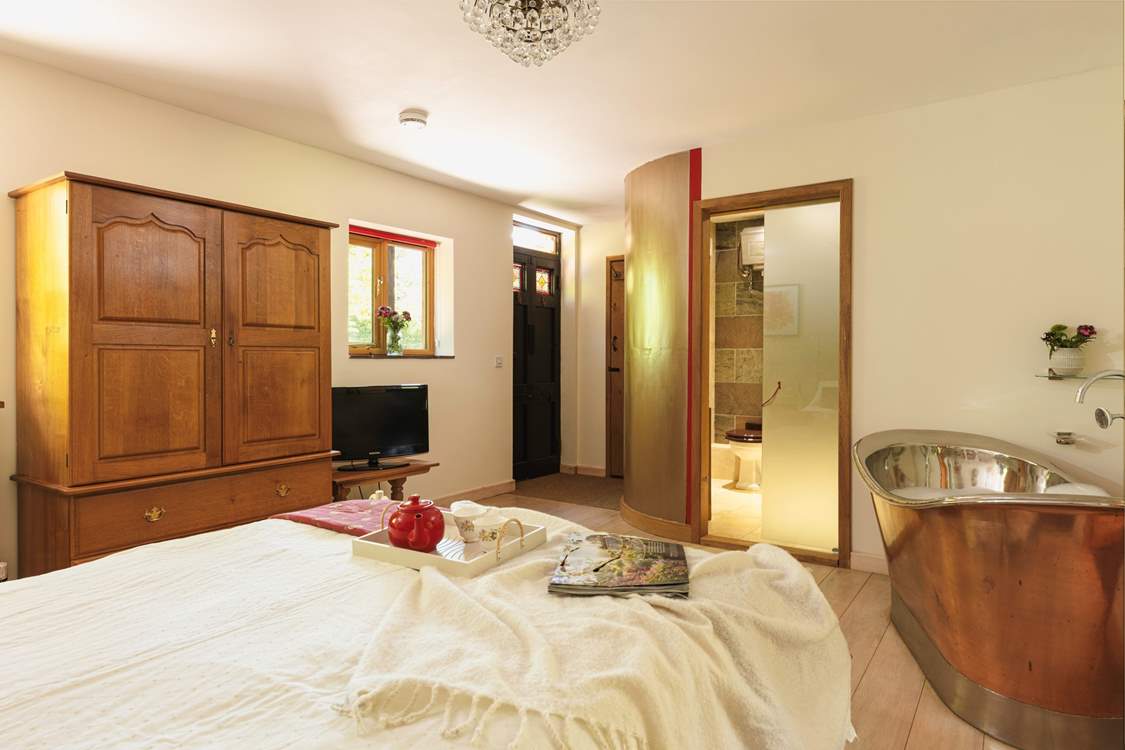 Relax in bed, or soak in the luxurious copper bath...the choice is yours.