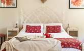 Sumptuous soft furnishings and pretty artwork, create a serene and calm space. - Thumbnail Image