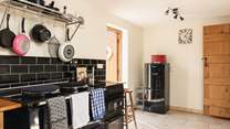 The front door leads you into the cosy kitchen.