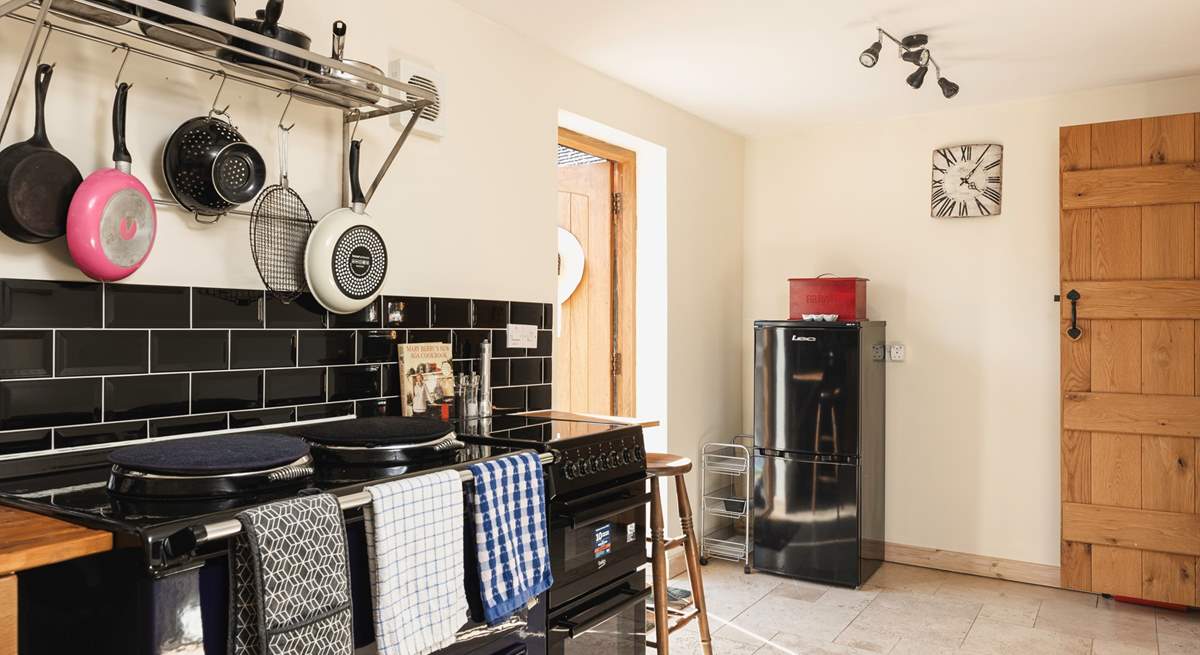 The front door leads you into the cosy kitchen.