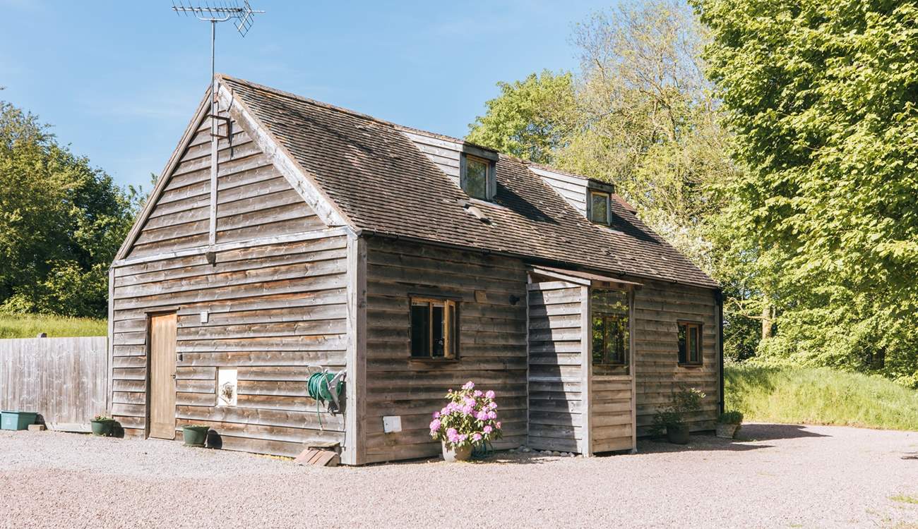 There is plenty of parking at the side of the barn.