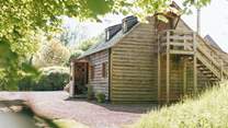 Accessible via an outdoor staircase, the second double bedroom provides privacy and seclusion.