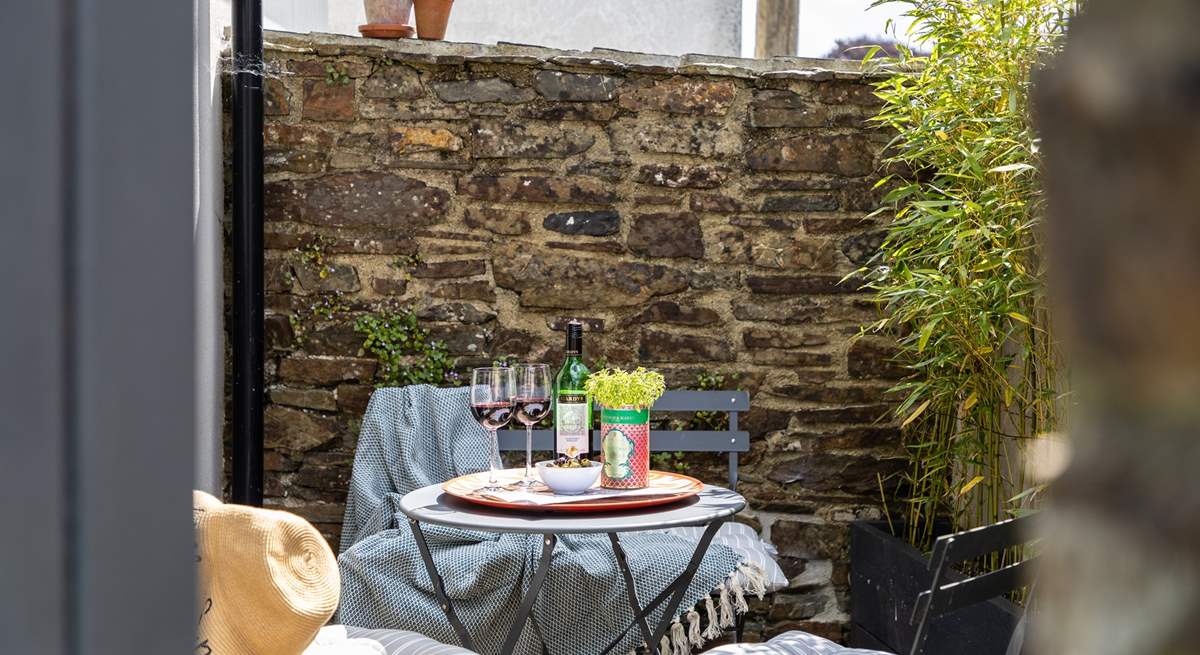 Step out of the patio doors into the courtyard where you can stoke the barbecue and pour a glass of wine.