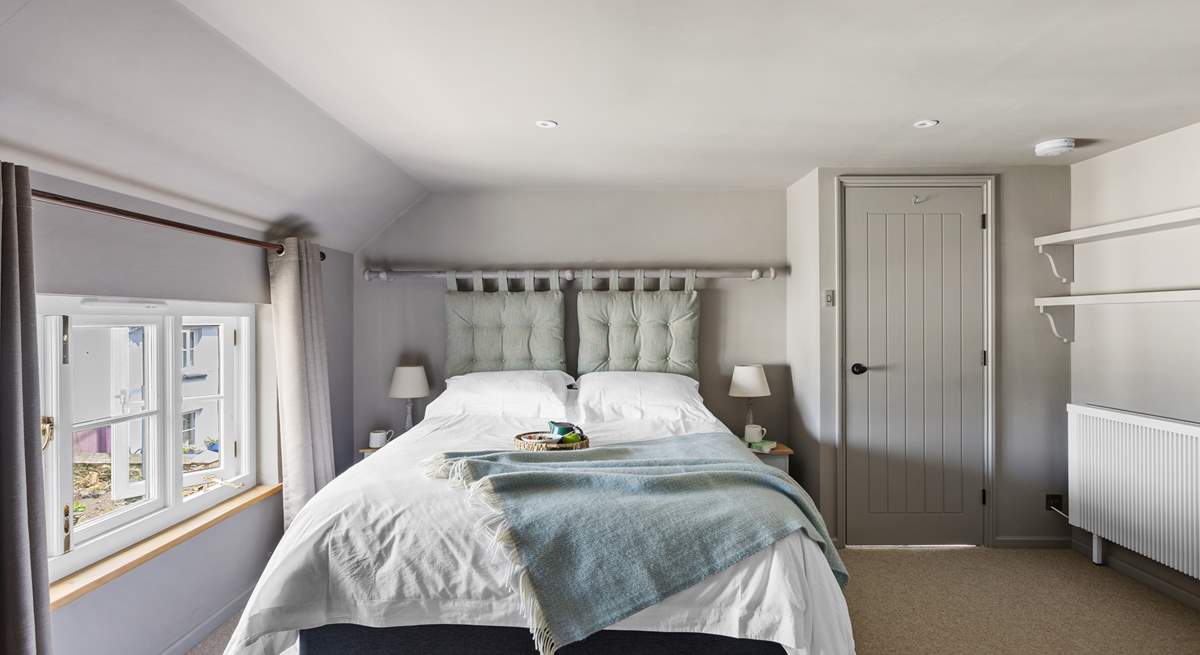 Bedroom 1 offers the option of a sumptuous super-king or twin beds. This rather lovely bedroom also benefits from an en suite cloakroom with wash-basin. 