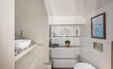 The perfectly positioned en suite cloakroom complements this 'zip and link' bedroom. - Thumbnail Image