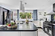 Take a pew and enjoy this bright, fully equipped kitchen.