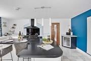 The kitchen is fully equipped, perfect for cooking up a family feast.