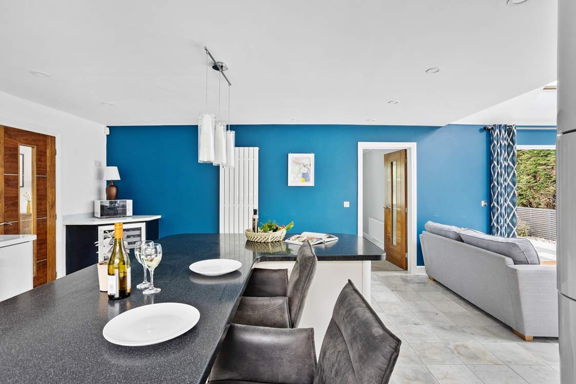 Head through the door to the dining-room.