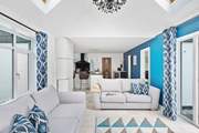 This wing of the house offers a lovely flow, making for a lovely sociable setting.