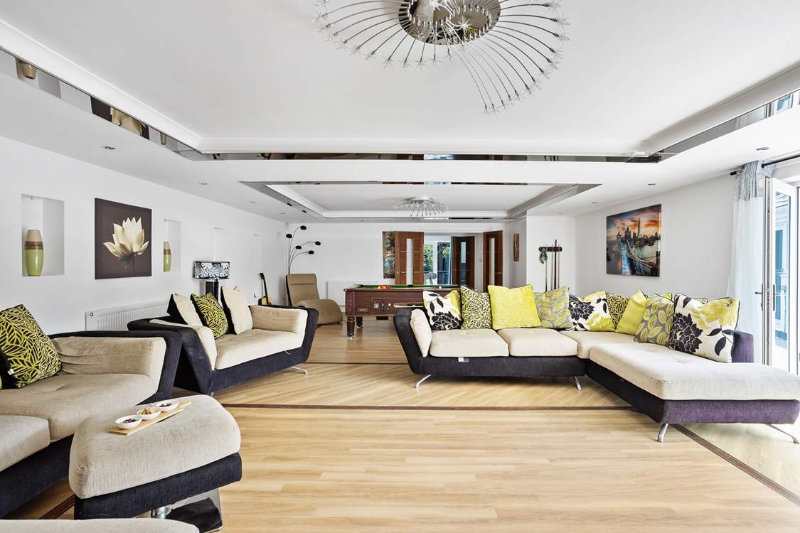 Sat at the far end of the house is the main sitting-room with a pool table, we have no doubt there will be lots of fun evenings in this room!