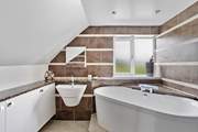 Sink into the bath and soothe aching legs.