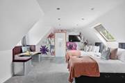 Another flexible 'zip and link' room, please note the sloping ceilings.