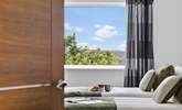 Bedroom 3 is a fabulous 'zip and link' bedroom with views out towards Dartmoor. - Thumbnail Image