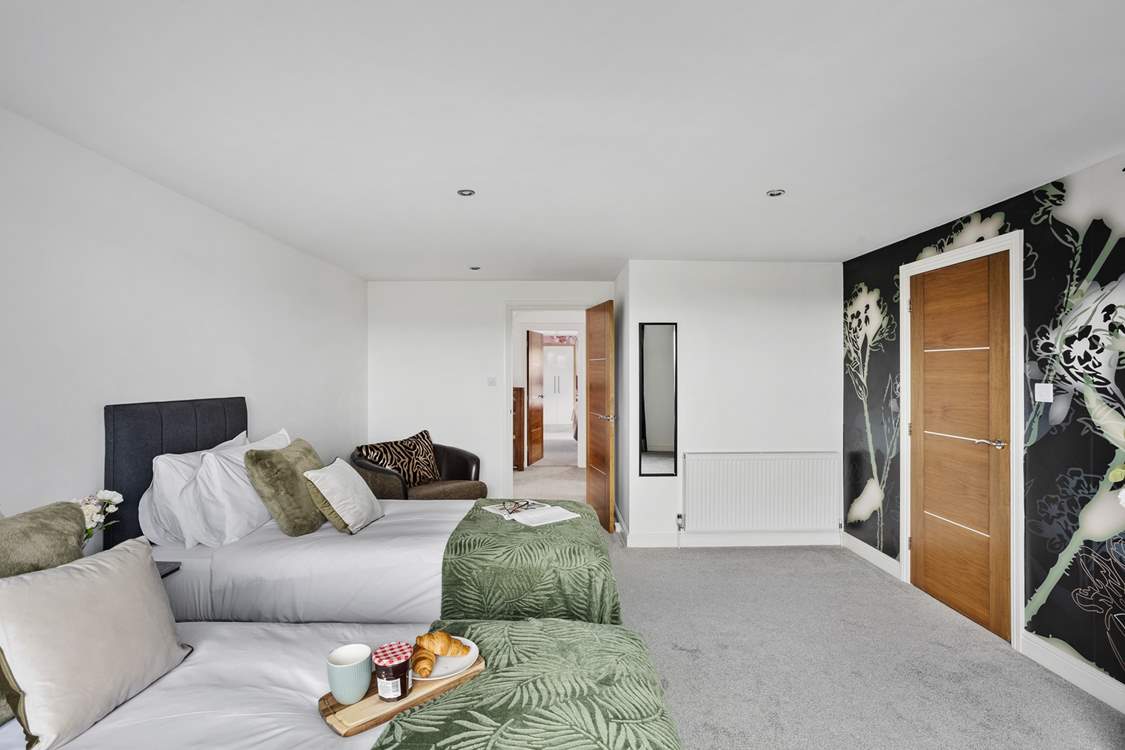 Head out of bedroom 4  to find bedroom 5. The family bathroom sits between both bedrooms.