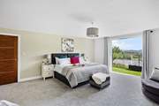 Head upstairs and discover bedroom 2 - a room with a view and balcony! Being 'zip and link' you can decide between twin beds or a super-king double.