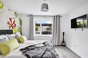 This king-size bedroom also has a Smart TV, perfect for music or indulging in a box set as the day draws to a close.